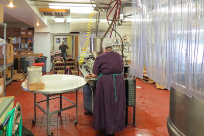 Amish women making jams and jellies at Scherger's Kettle Jams & Jellies in Shipshewana, Indiana